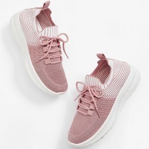 a pair of womens athletic shoes from maurices new condition never worn tried on